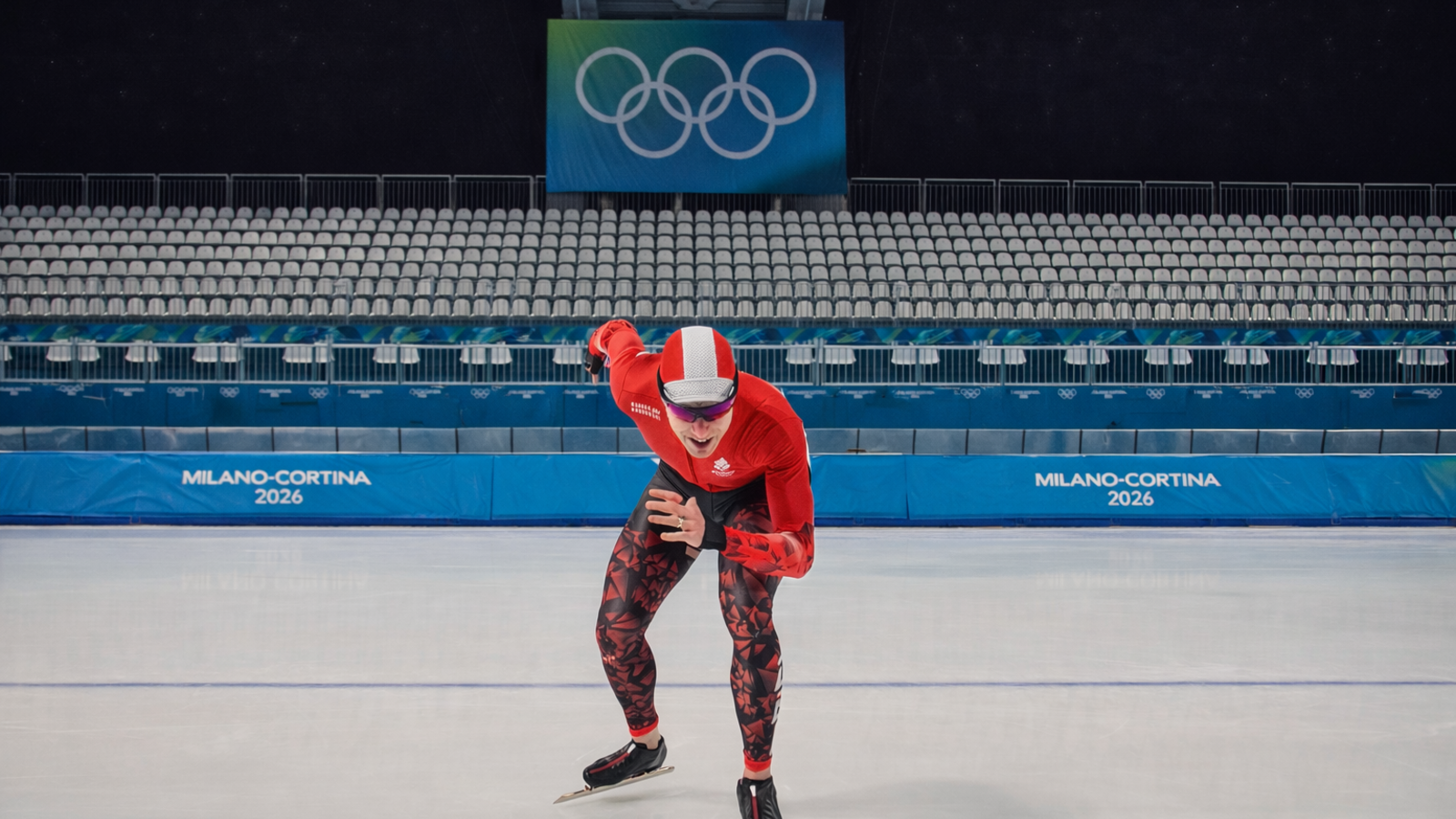 Viktor Thorup - Speed skater training on the ice at the Milano-Cortina 2026 Olympic venue, practicing skating technique and balance